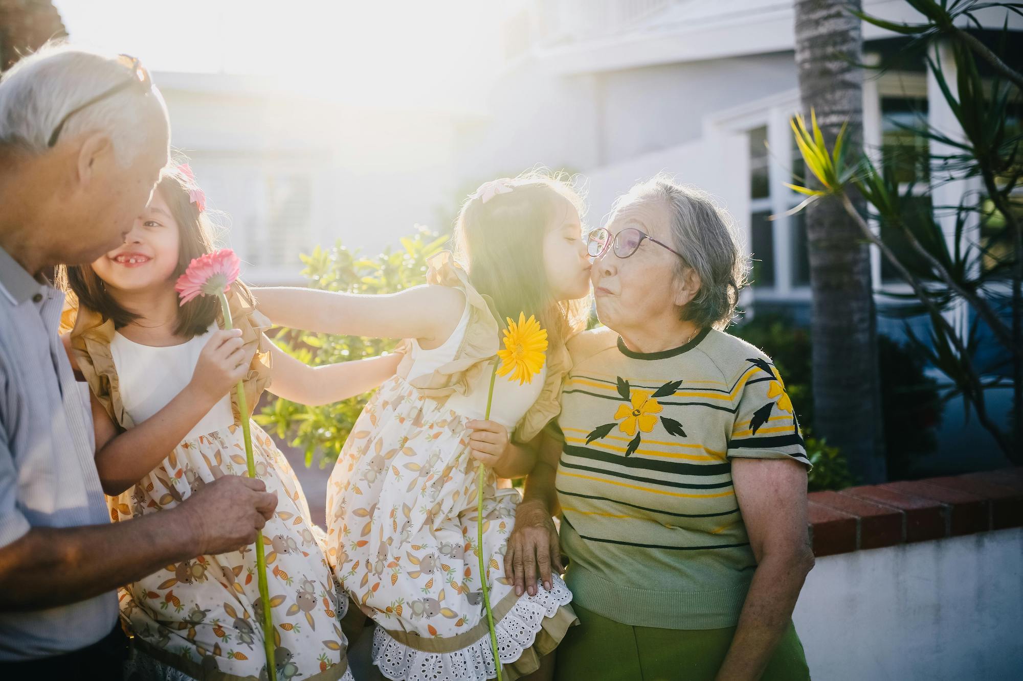 healthy grandparents and grandchildren with flowers, CPR Your Life